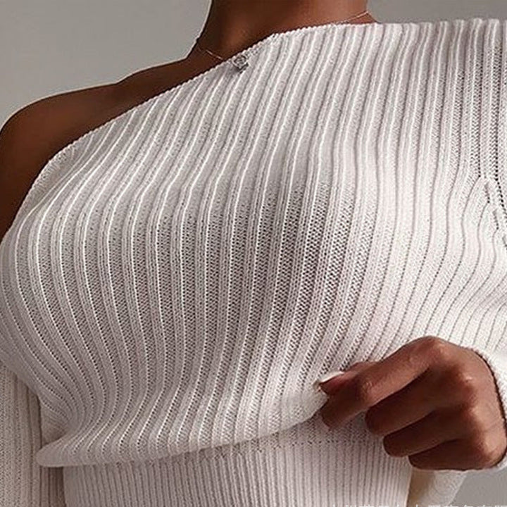 Female model wearing white one-shoulder ribbed knit top