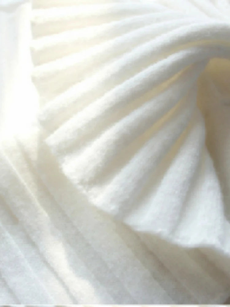 Close-up of white fabric with folds