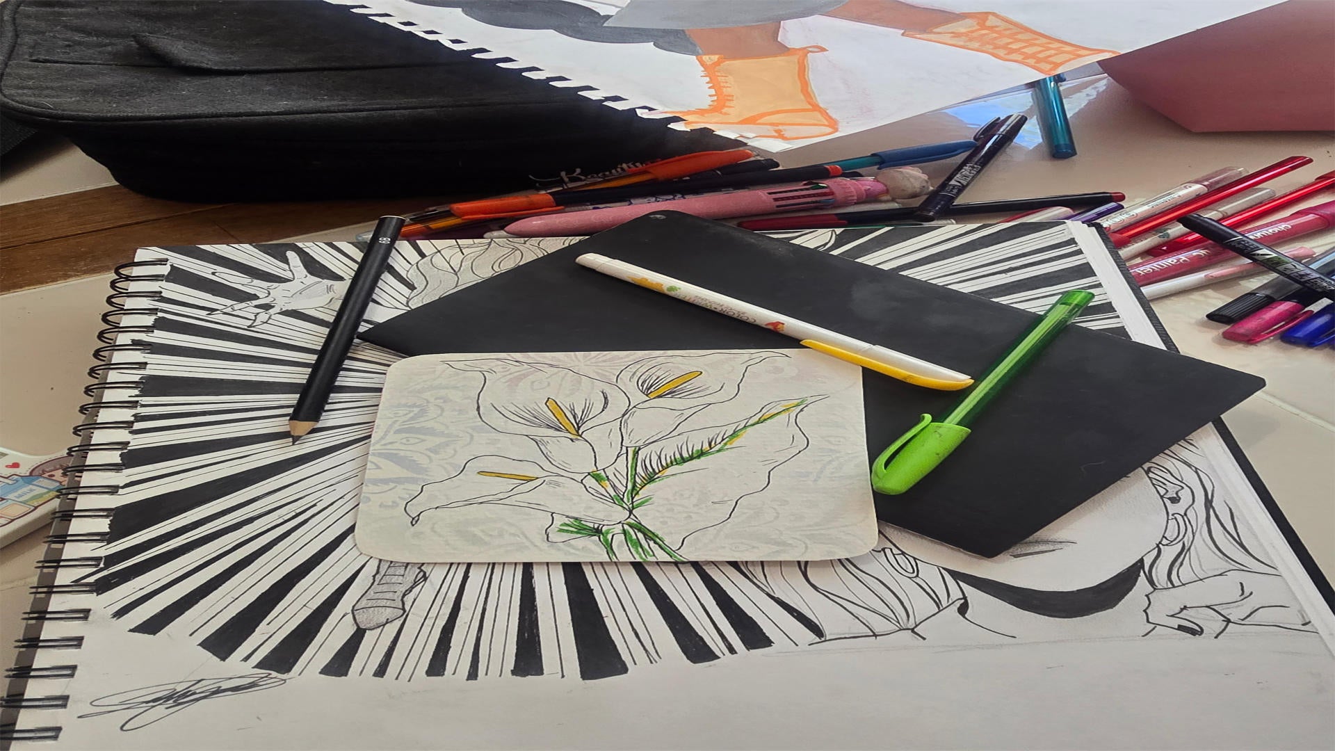 Polendo Design hand-drawn sketchbook artwork with floral illustration, pens and markers showing original art creation process for prints and apparel